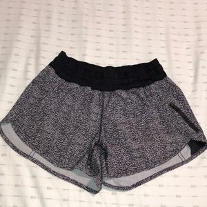 Lululemon tracker shorts, size 6, tear in liner
